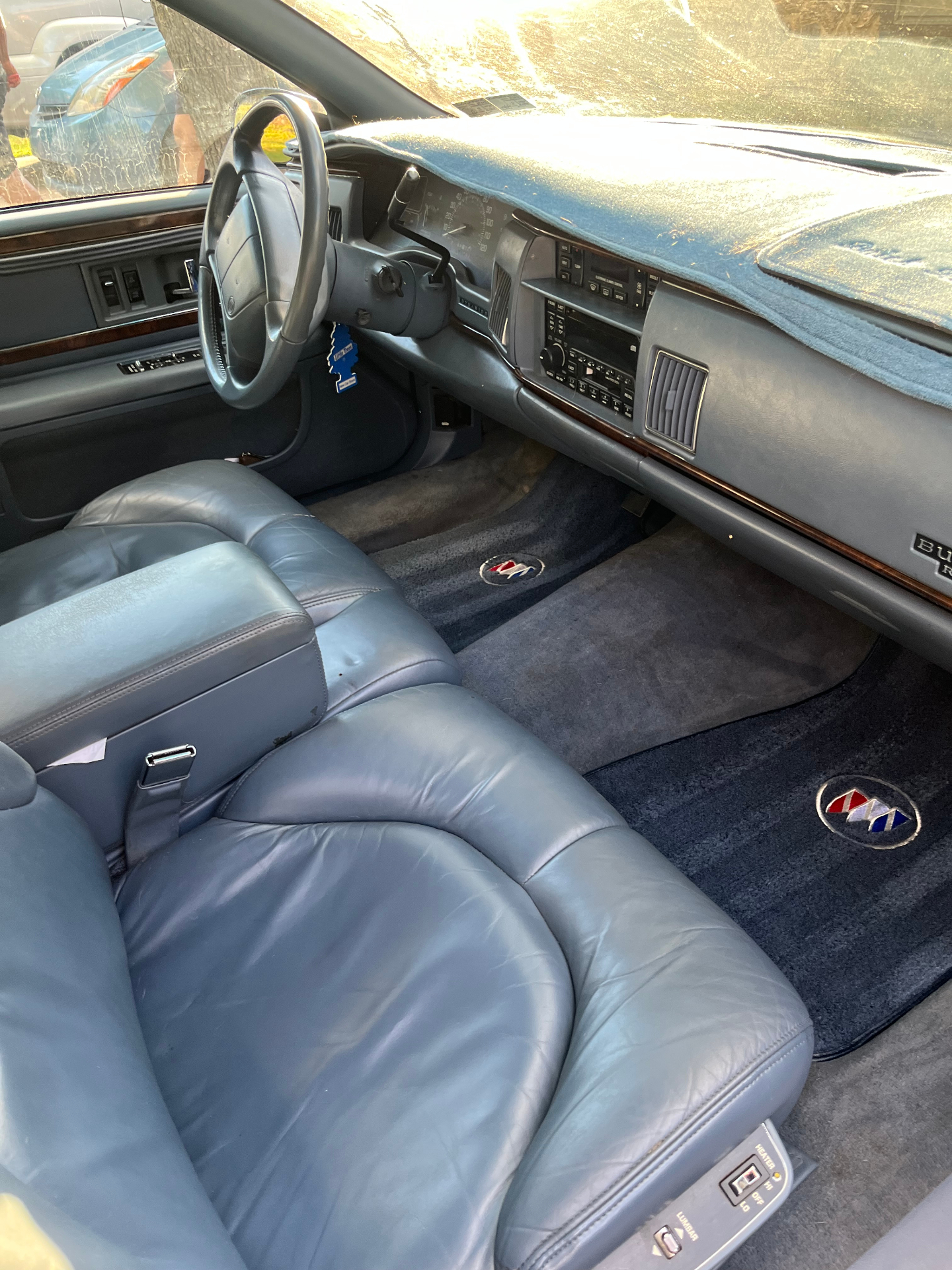 Detailed Buick interior with blue leather seats